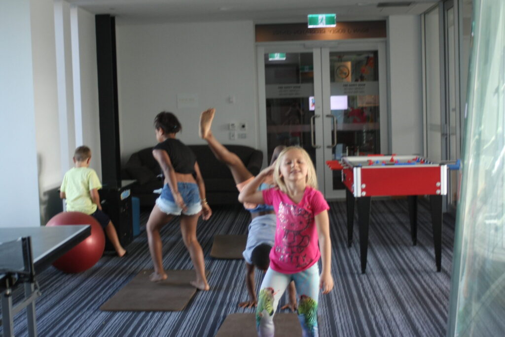 Kids enjoying themselves in the recreation room