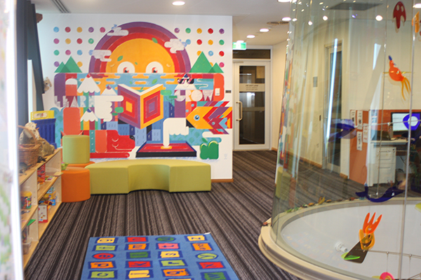 Photo of the learning centre with chairs and books and toys