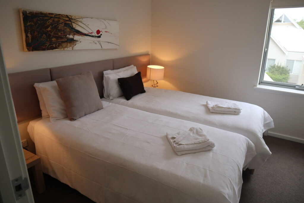 Photo of one of the bedrooms of the Busselton Retreat showing 2 single beds