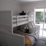 Photo of one of the bedrooms at the Bunbury retreat showing a single / queen bunk bed