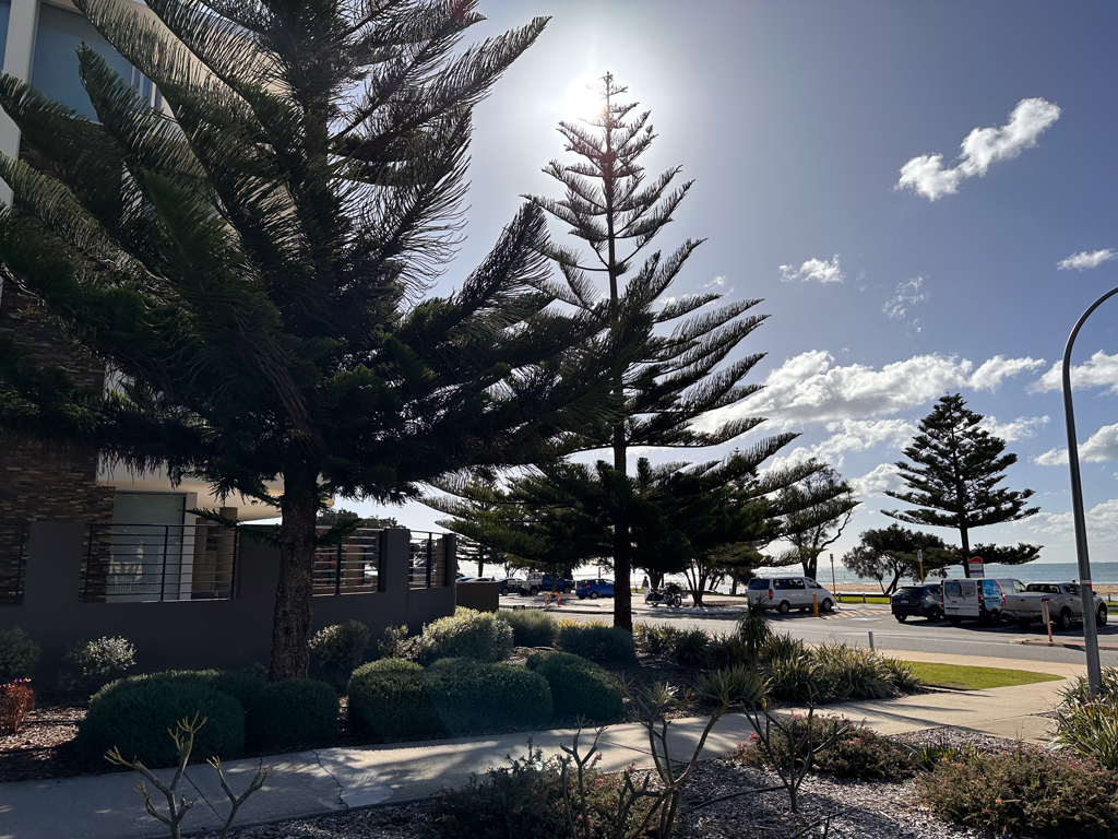 A photo of the exterior of the apartment complex where the Ronald McDonald Family Retreat in Mandurah is located, looking out to Doddi's beach
