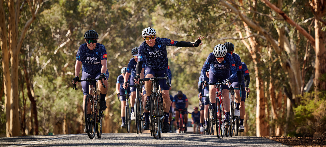 RFSK WA - Event Page - Cover Photo 2025 peloton of riders pedalling through