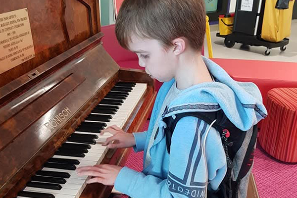 Ryder playing the piano