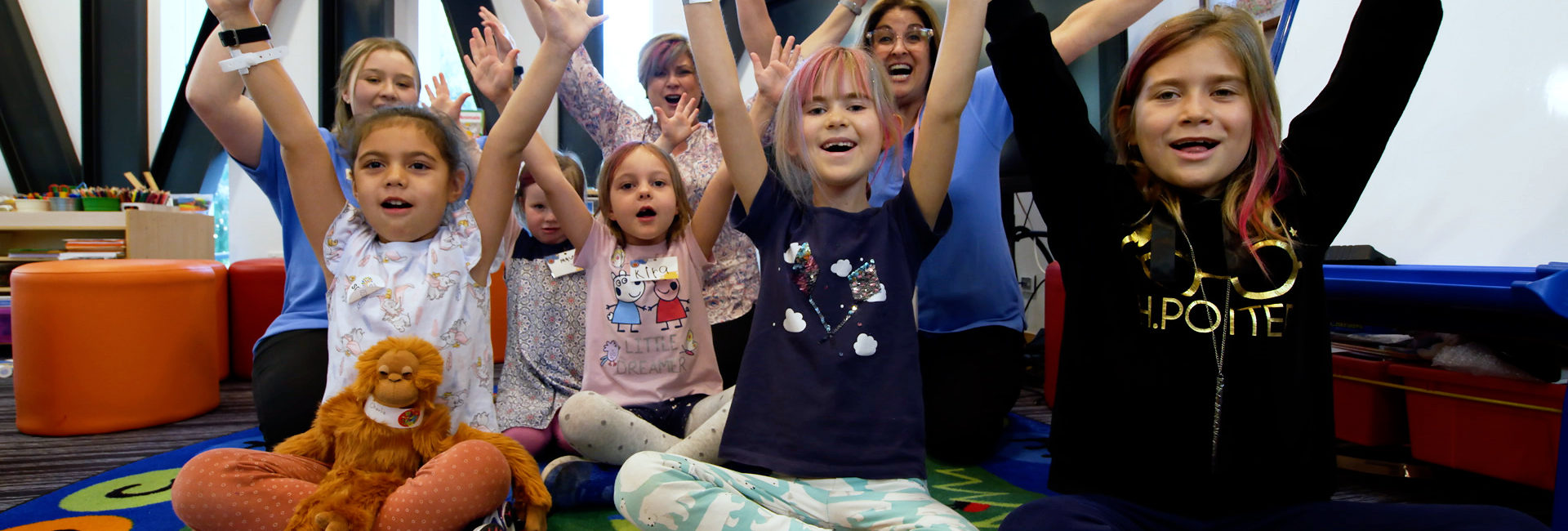 Photo of children looking happy in the Bass Family Foundation Learning Centre