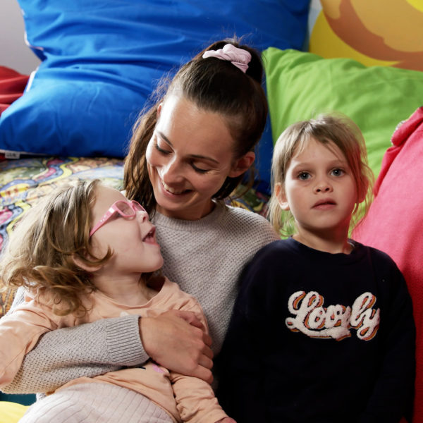 Photo of children with their mother at Ronald McDonald House Nedlands