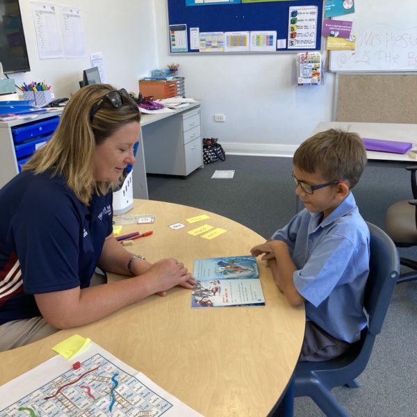 Photo of child in a session with a RMLP tutor