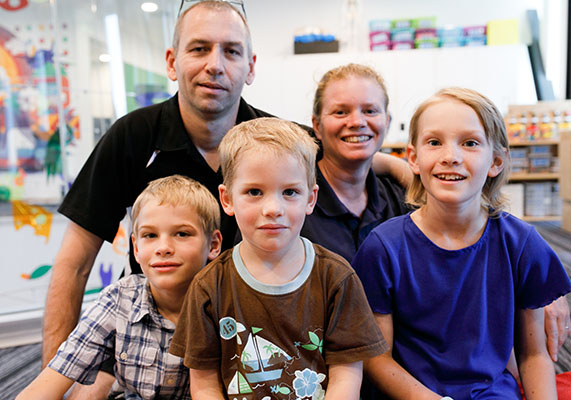 Photo of a family in the Learning Centre at Ronald McDonald House Nedlands