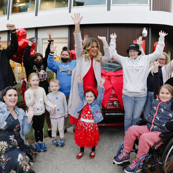 Photo of Natalia Cooper and children staying at the house jumping in excitement