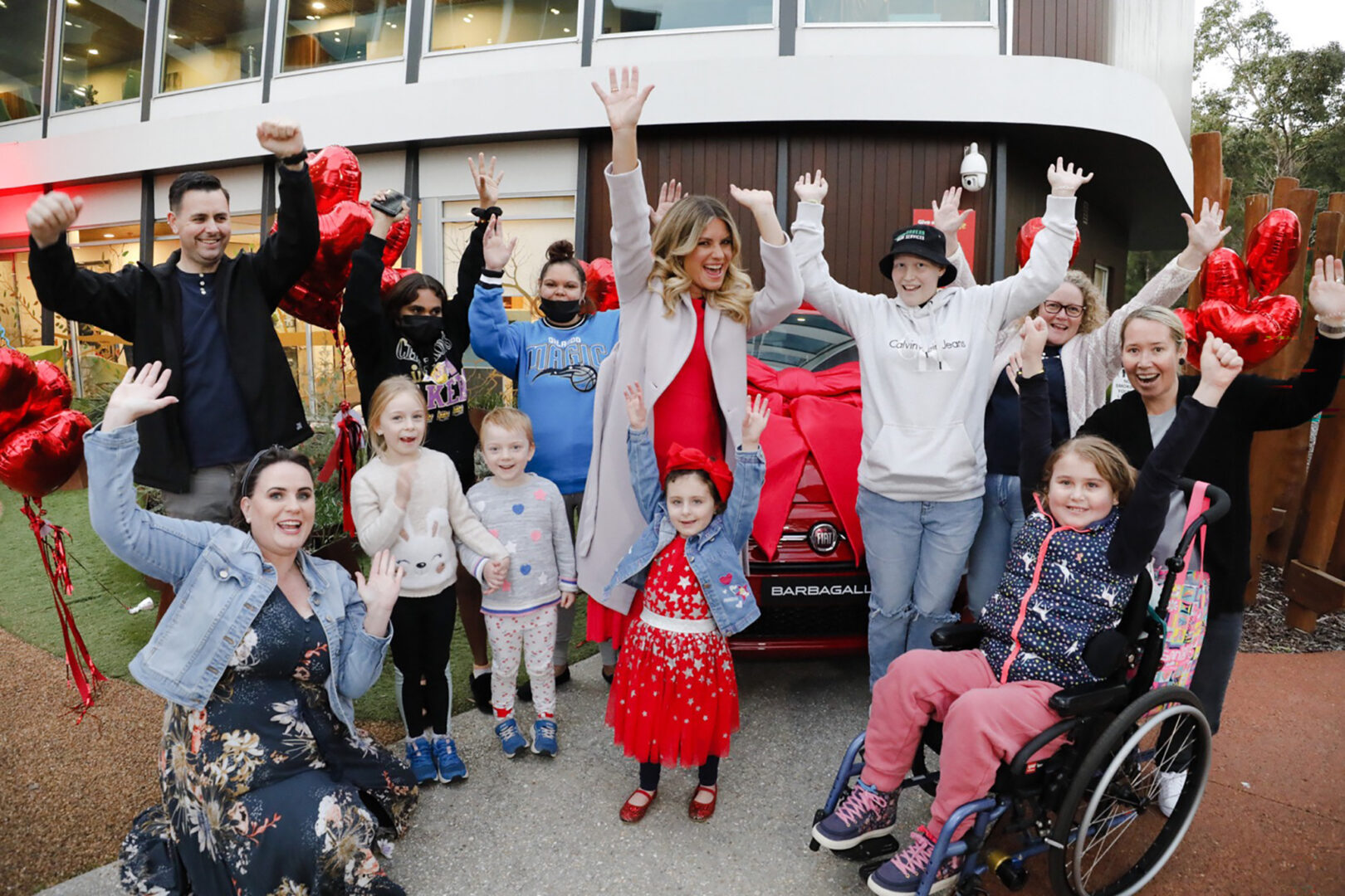 Photo of Natalia Cooper and children staying at the house jumping in excitement