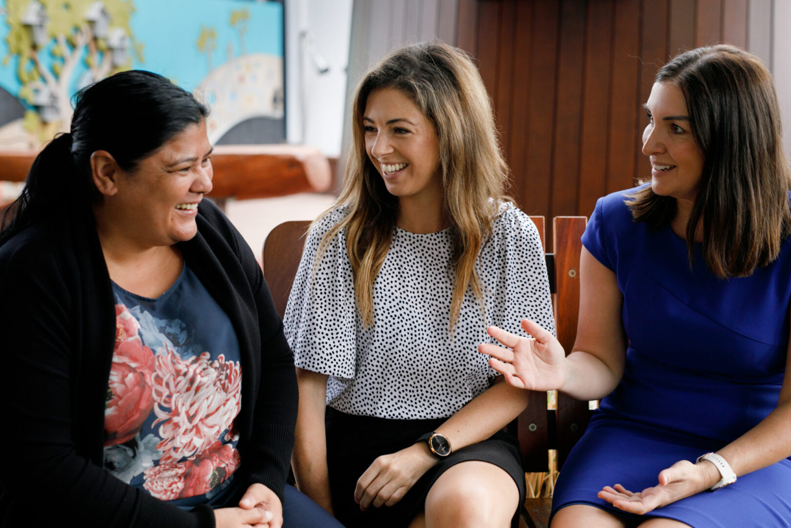 Work With Us - UPDATED IMAGE Photo of RMHC WA staff talking to one another